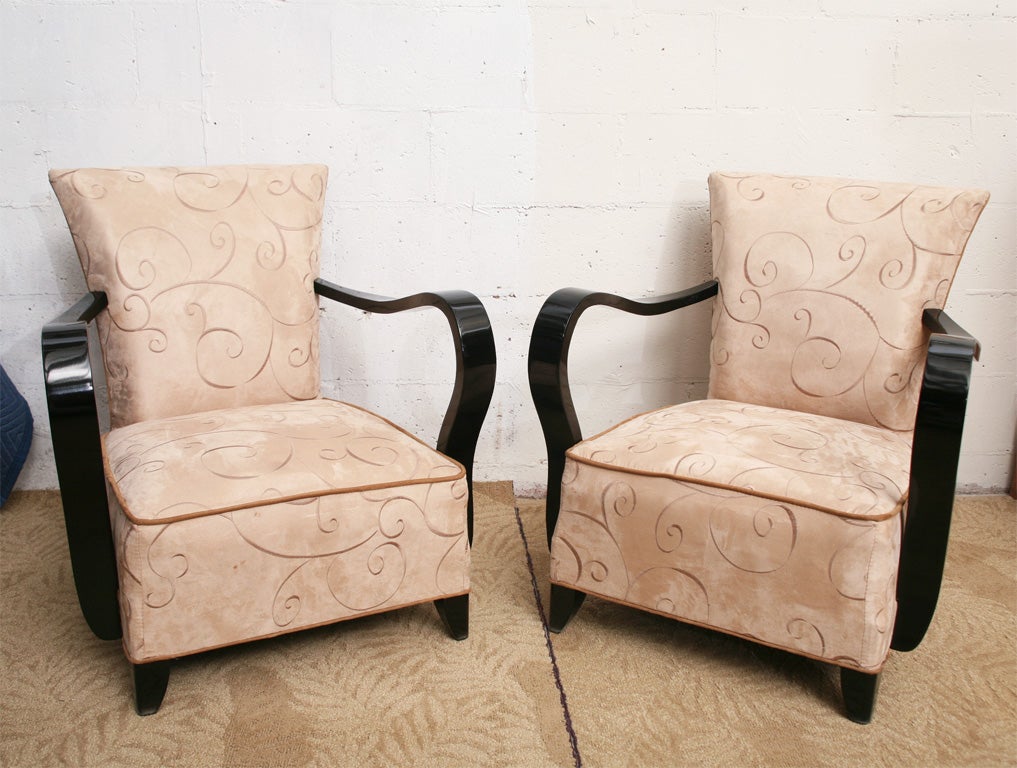 STUNNING AND PRISTINE! PAIR OF FRENCH ART DECO CLUB CHAIRS, CIRCA 1930'S. TOTALLY REFINISHED, BLACK LACQUER FINISH AND BRAND NEW UPHOLSTERY [TAN/ CREME SUEDE]. VERY COMFORTABLE, THE CUSHIONING ON BOTH THE SEATS AND BACKS HAVE BEEN RESTORED.