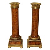 8058  A PAIR OF WOODEN AND BRONZE DORE CANDLESTICKS