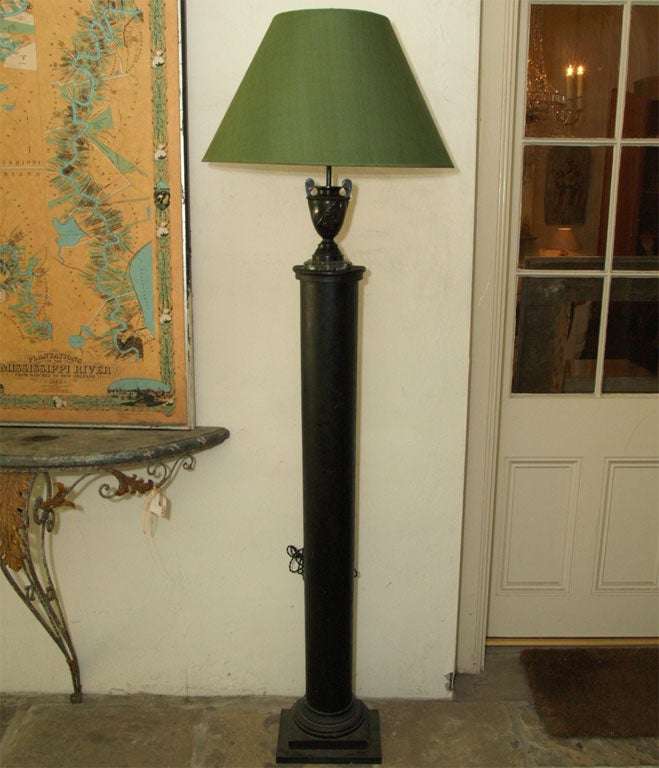 * 8005  A PAIR OF BRONZE URN LAMPS UPON  CLASSICAL COLUMS