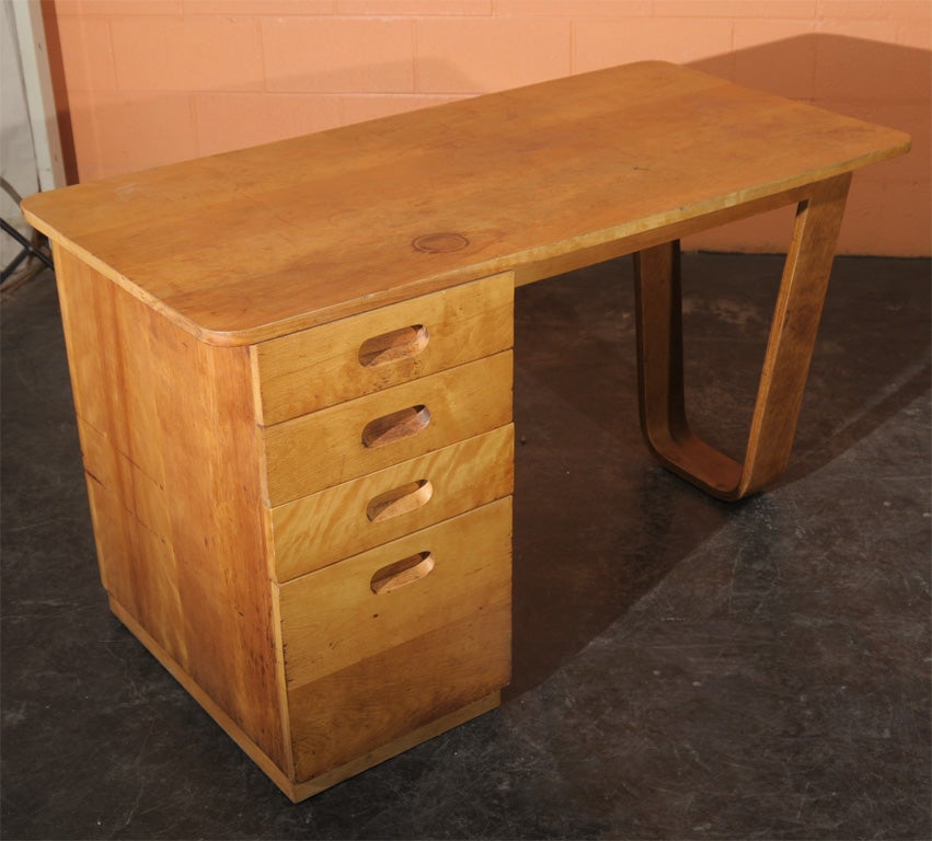 This piece is an original desk designed by Marcel Breuer. One of Breuer's first projects after coming to the United States was a 1937-38 commission for the design of the furniture for Rhoads Hall, a dormitory at Bryn Mawr College.  The desk features