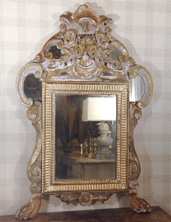 French Fragment Mirror constructed from 17th and 18th century found objects.  Beatiful layers of white and cream paint accented with gold guilding.