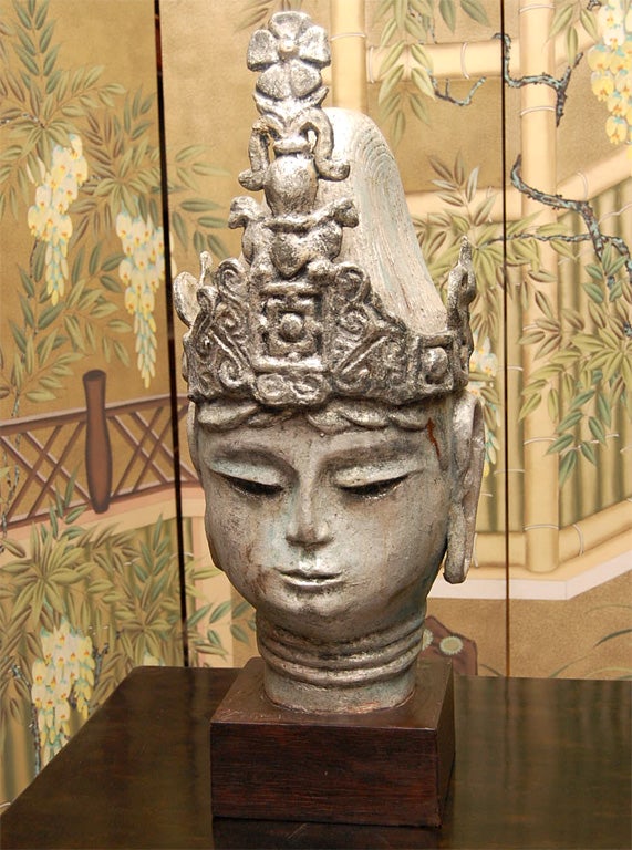 Late 19thC.Thai Silver Leafed Buddha Head on Wooden Stand In Excellent Condition In East Hampton, NY