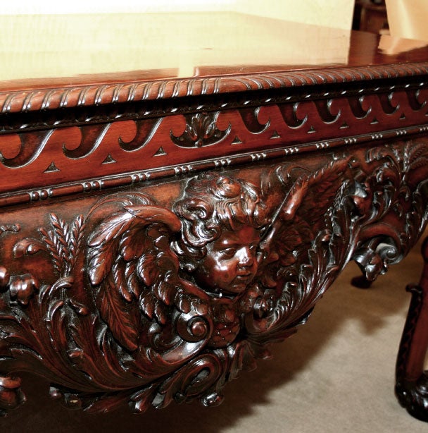 GEORGE II STYLE CARVED MAHOGANY CONSOLE WITH WINGED CHERUBS AN 1
