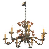 Whimsical painted iron and wood chandelier