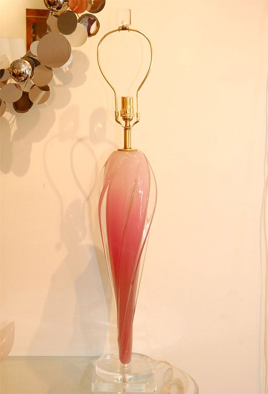 Epic piece of Murano glass mounted on a Lucite base, rewired with solid brass socket and twisted Rayon cord.