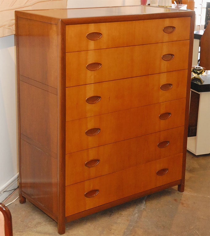 Beautiful six drawer tall dresser in Walnut with Elmwood drawerfronts.  Carved Mahogany recessed drawer pulls by Michael Taylor for Baker Furniture.