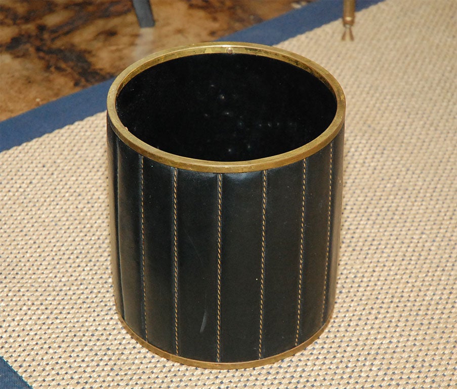 Leather and brass waistebasket in the style of Jacques Adnet