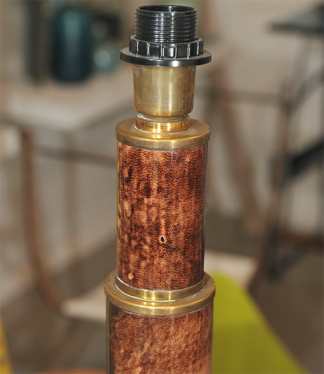 Very handsome parchment and brass table lamp, rewired for the US, priced without shade.