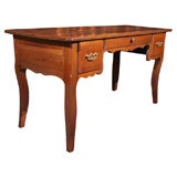 Antique French fruitwood bureau plat.
