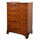 Antique English tall flame mahogany chest of drawers.