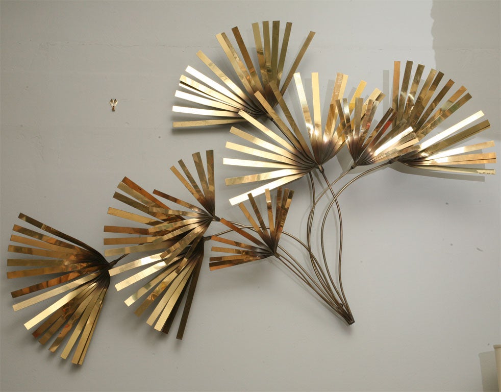 This large-scale, brass, palm wall sculpture would be perfect in a - in your - modern beach house. Signed C Jere 1979.