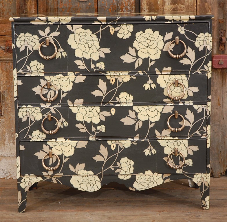 Large, 4 drawer, American mahogany chest of drawers newly covered in English Cole & Sons floral wallpaper.  Blonde French polish finish.  New solid bronze drawer pulls and inlaid faux ivory drawer escutcheons. All original dovetailed construction.