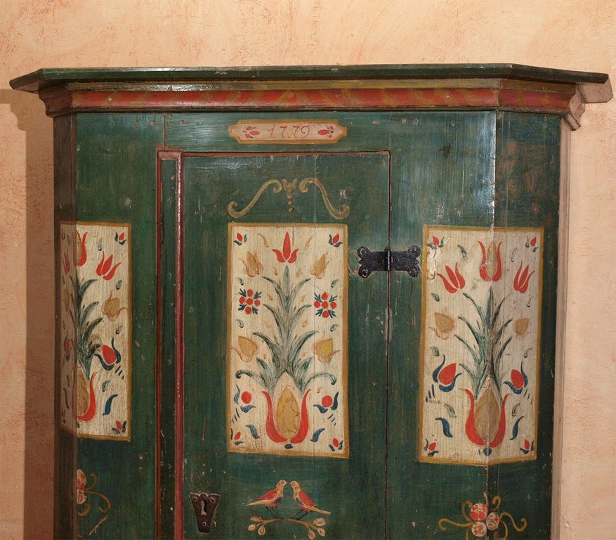 18TH CENTURY AUSTRIAN HAND-PAINTED MARRIAGE ARMOIRE.  CIRCA 1779.<br />
H 70½