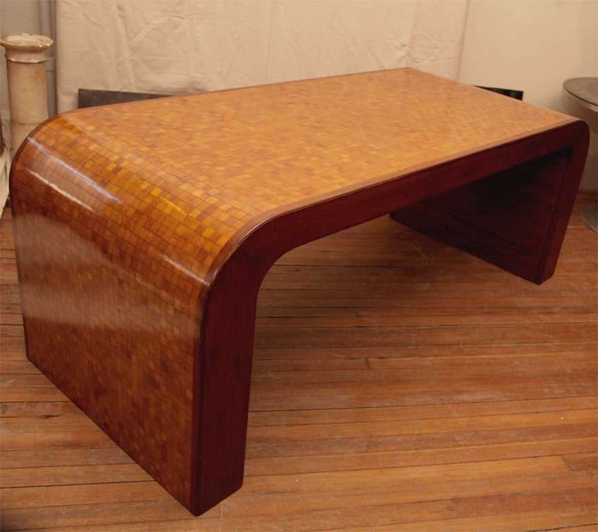Large desk or console, in waterfall style, mahogany, with intricate satinwood marquetry, 1930's period