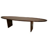 A Robsjohn-Gibbings Elliptical Surfboard Coffee Table.