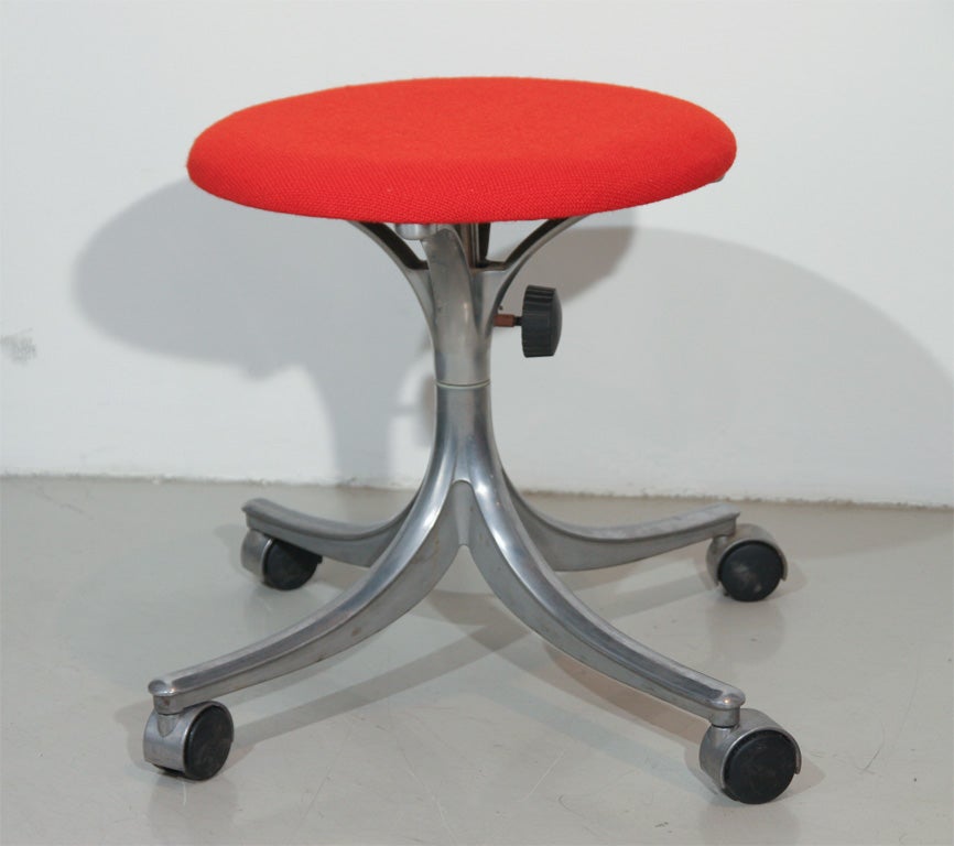 Great looking stool with red wool seat.