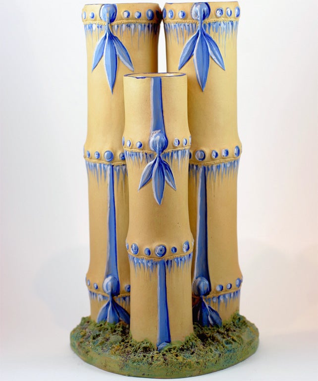 A rare Wedgwood caneware triple bamboo vase decorated with encaustic colors, upper case mark