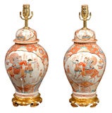 PAIR OF ORIENTAL JARS AS LAMPS, ORANGE