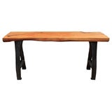 Natural wood table with industrial metal legs