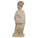 Pottery sculpture of a court lady. Tang Dynasty, China