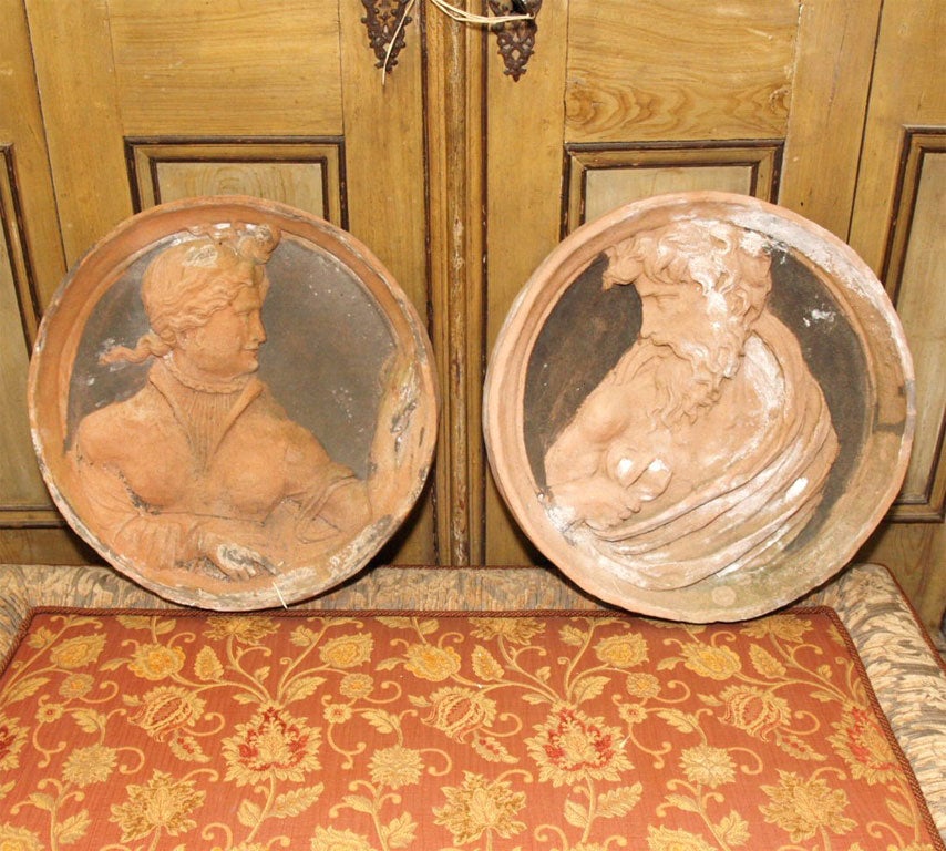 8018   PAIR OF TERRACOTTA PLAQUES