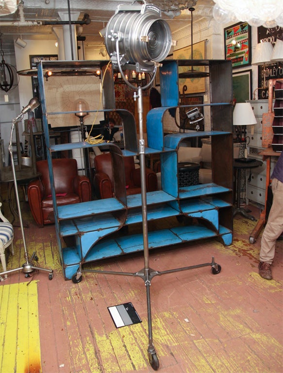 Film studio light made by Bardwell and McAlister, Inc. in Hollywood, CA during the Golden Era of film. Rewired with modern electrics to be used as a standing lamp.  <br />
Adjustable height from 83