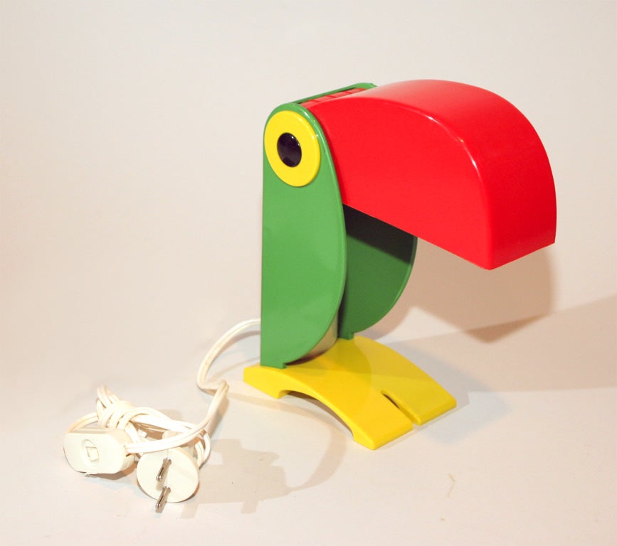 Small children's lamp in shape of Toucan. The red beak hinges to modify the degree of light. Max. wattage is 25W.
