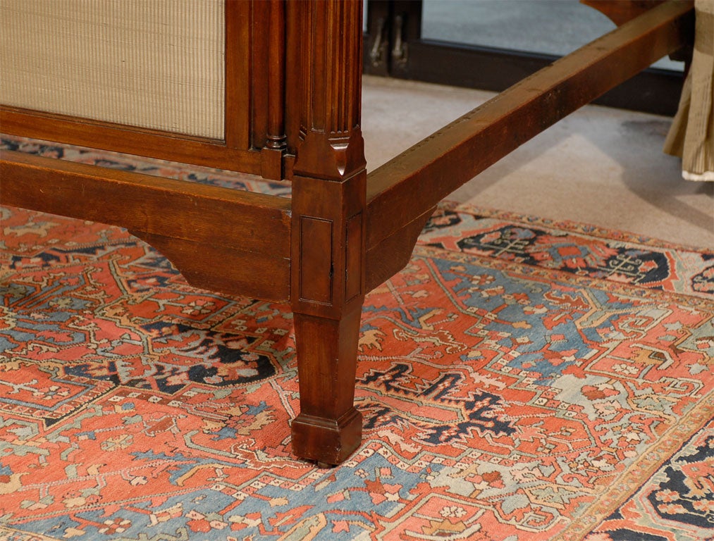 A Fine George III Mahogany and Painted Four-Post Tester Bedstead, originating in England during the last quarter of the 18th Century.<br />
<br />
The arched tester painted in an attractive muted palette decorated with garlands of flowers, musical