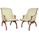 A Pair of Neoclassic Sleigh Back Armchairs