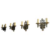 Four incredible gothic tudor sconces. Signed