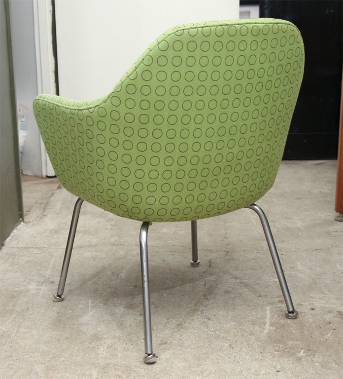 Pair of Eero Saarinen arm chairs on tubular chrome legs, mfg. Knoll. They have been reupholstered in Maharam fabric.