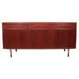 Teak credenza on tubular chrome legs in the style of Arne Vodder