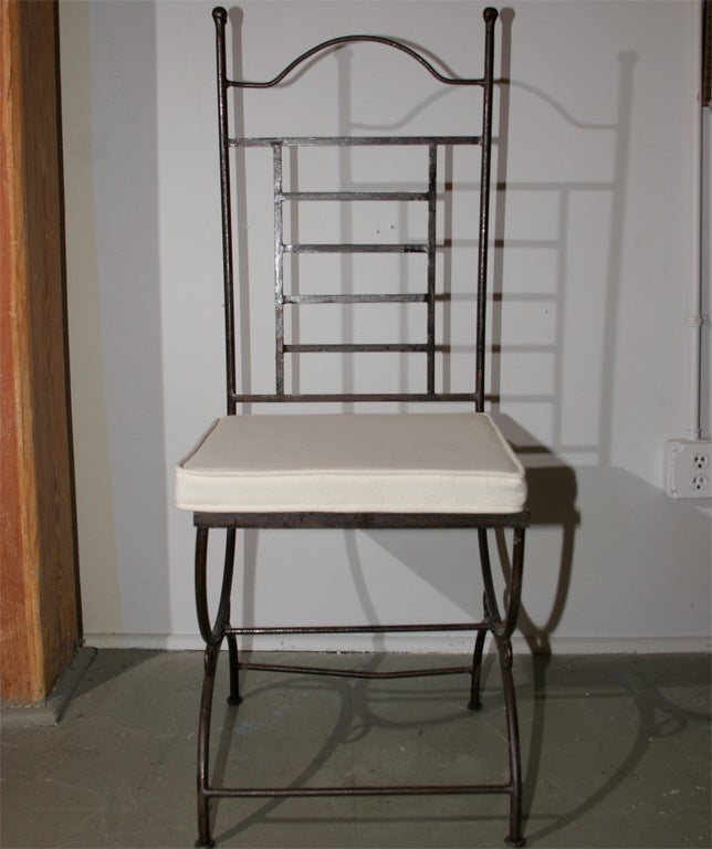 Henri Burton found these in the south of France.  Iron garden chairs with cushions. (Several more available)  $285 each.