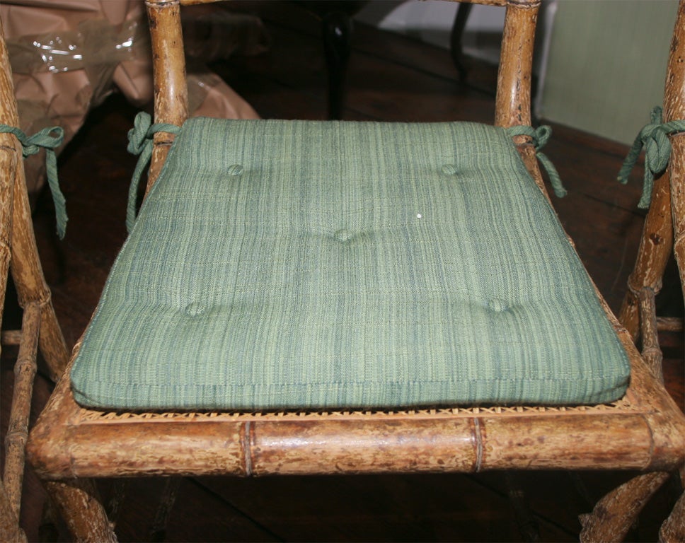 Paint Set of four Regency klismos form side chairs, c.1810
