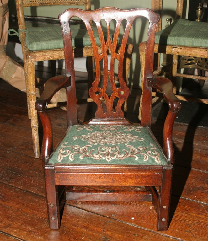 George III antique carved mahogany Chippendale child's open armchair. English, circa 1775