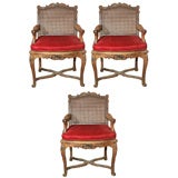 A Pair of Regence Style Carved and Painted Fauteuils