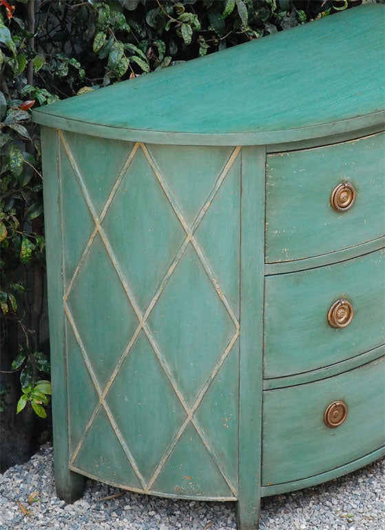 American Pair of painted demilune chests of drawers