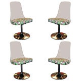 Set of Four Lucite Swivel Chairs
