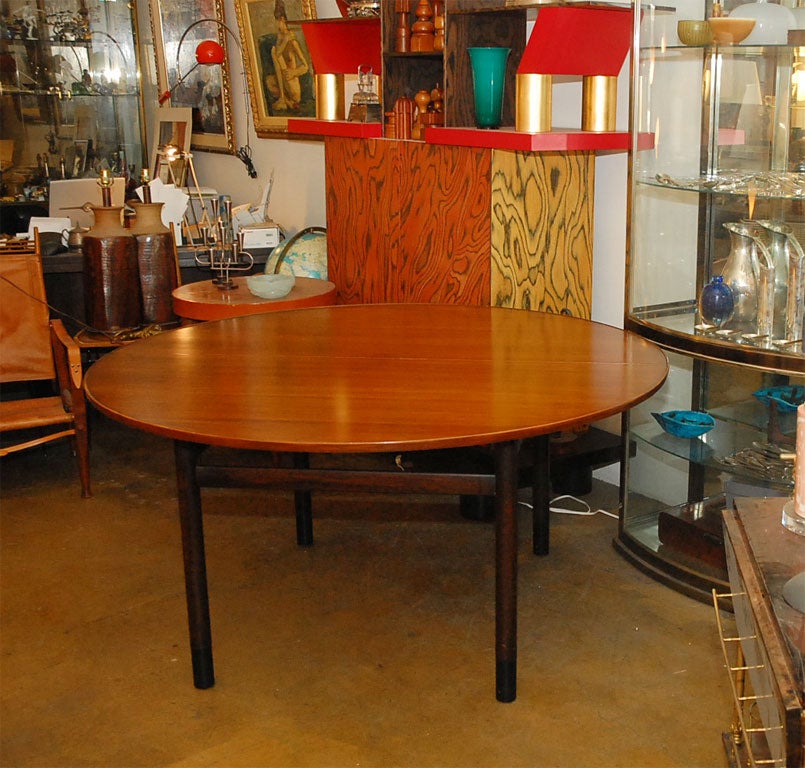 This a rare  and elegant round dining table with a great diametes of 60 inches and you can add a leaf of 20 inches.