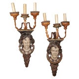 Used Italian wall plaques converted into sconces