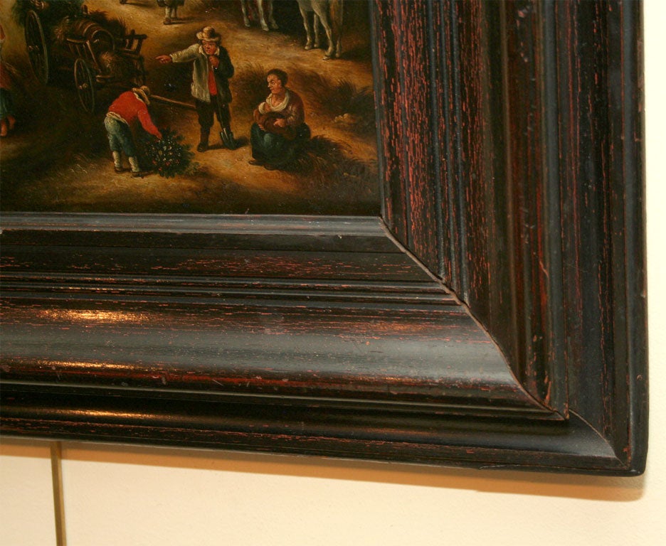 Flemish school, country scene, oil on board.
Framed in period, ebonized wood frame.