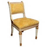 Set of Eight Regency Parcel Gilt and Cream Painted Dining Chairs