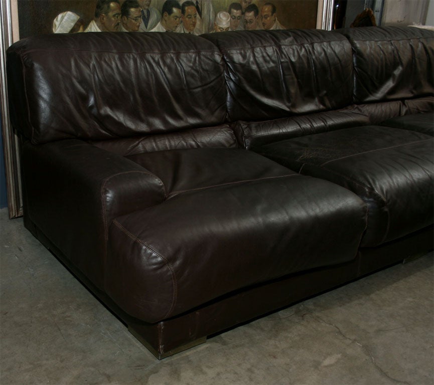 A beautiful chocolate brown sofa by Jerome Perez. Top stitched and substantial, this sofa is comfortable and great looking.