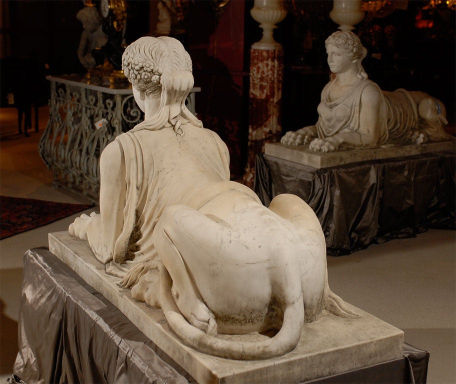Pair of Carrera marble sphinxes 1