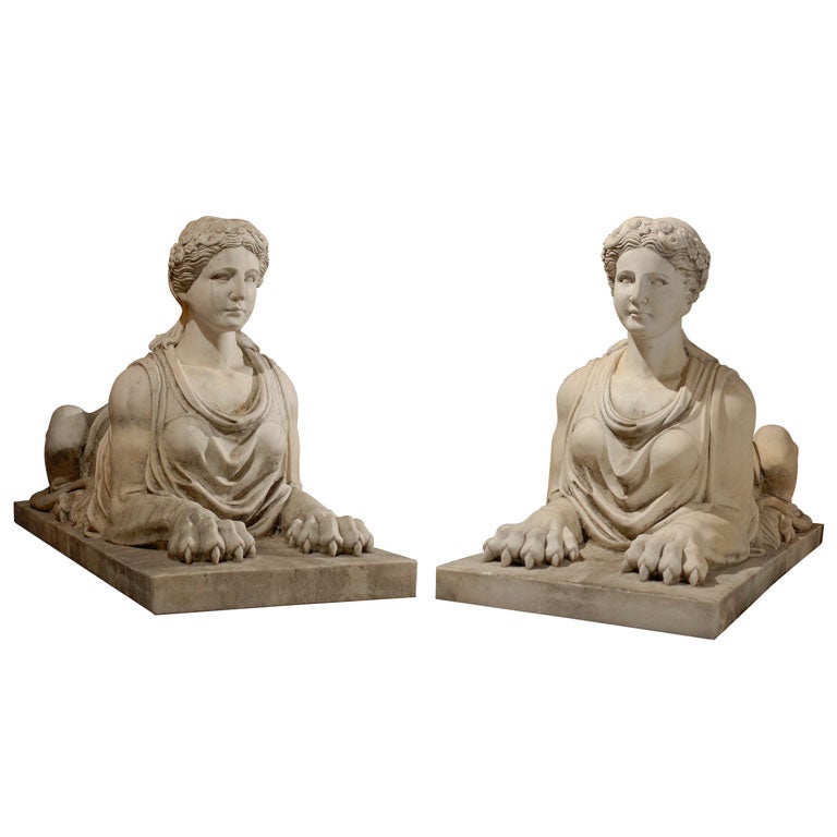 Pair of Carrera marble sphinxes