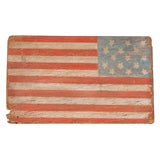 FOLKY EARLY 20THC PAINTED FLAG ON BOARD FROM NEW ENGLAND