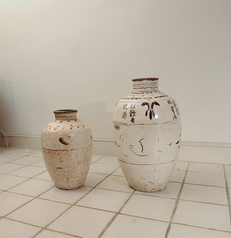 Glazed Ceramic Wine Vessels. The large painted with poems relating to the four seasons.