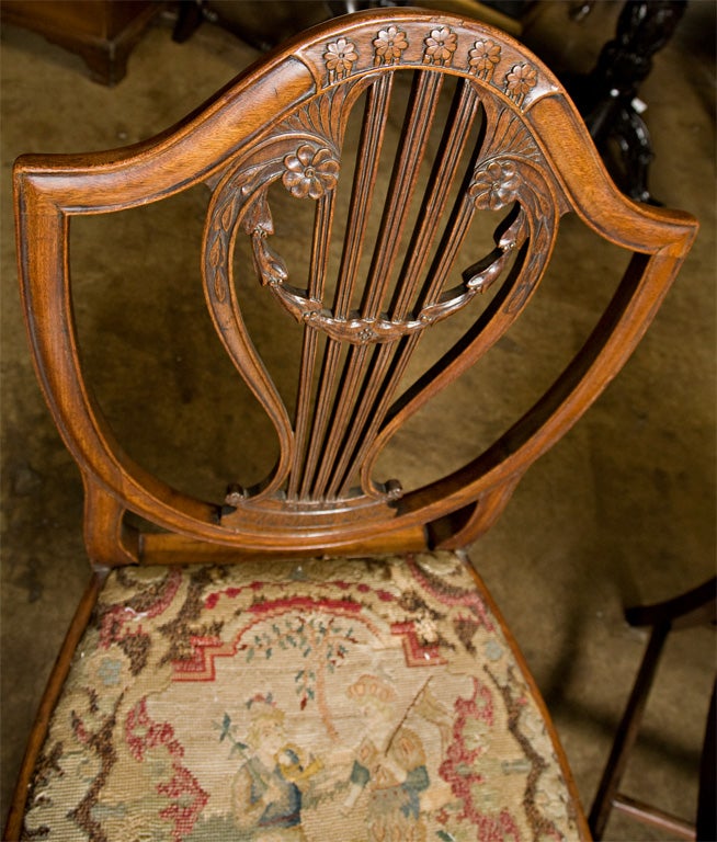 Mahogany George III Shield Chairs, w/ 17th c. needle work seats