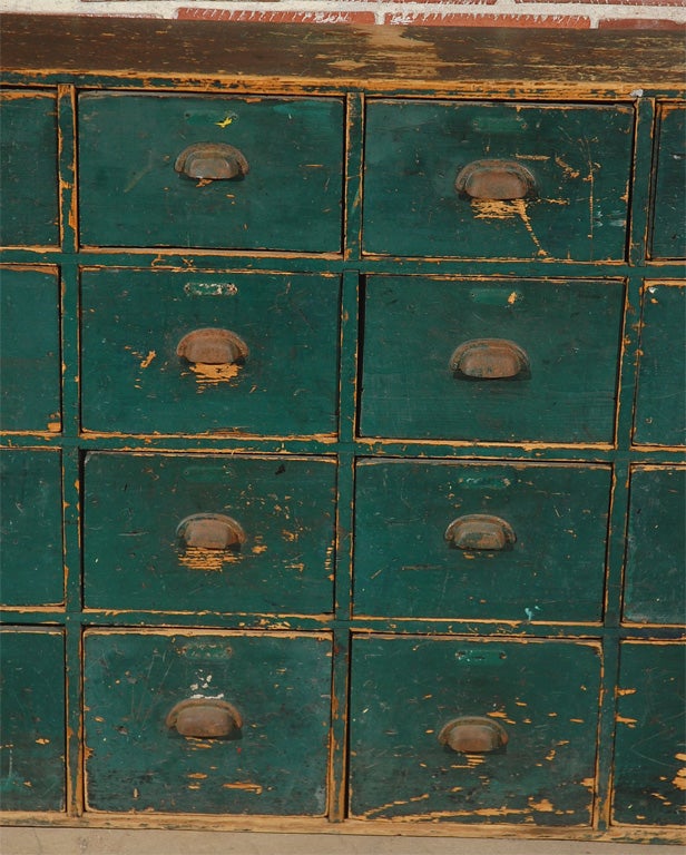 Substantial 24 drawer apothecary in original surface.