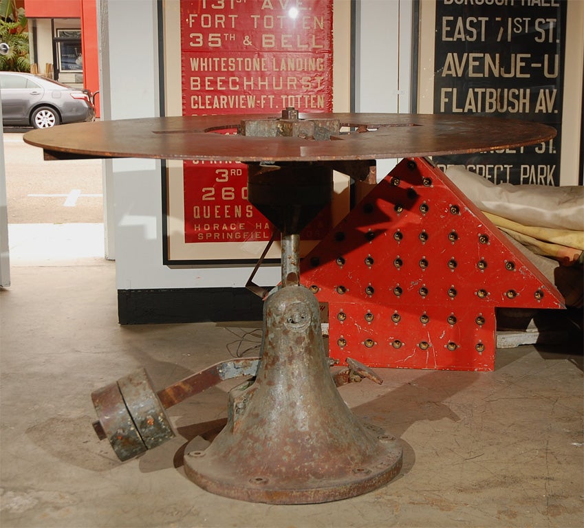 Fantastic American welder's iron table. Fully functional today as a bar table or unusual dining table. Perfect height for bar stools. Found in Texas and most likely part of the Temco Aircraft company in Dallas and likely used for aircraft wings. It